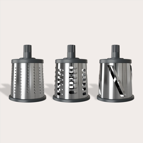 The Zyliss Gourmet Drum Grater Set is a kitchen essential, featuring three stainless steel drums with dark gray plastic tops and bases for fine grating, coarse grating, and slicing.