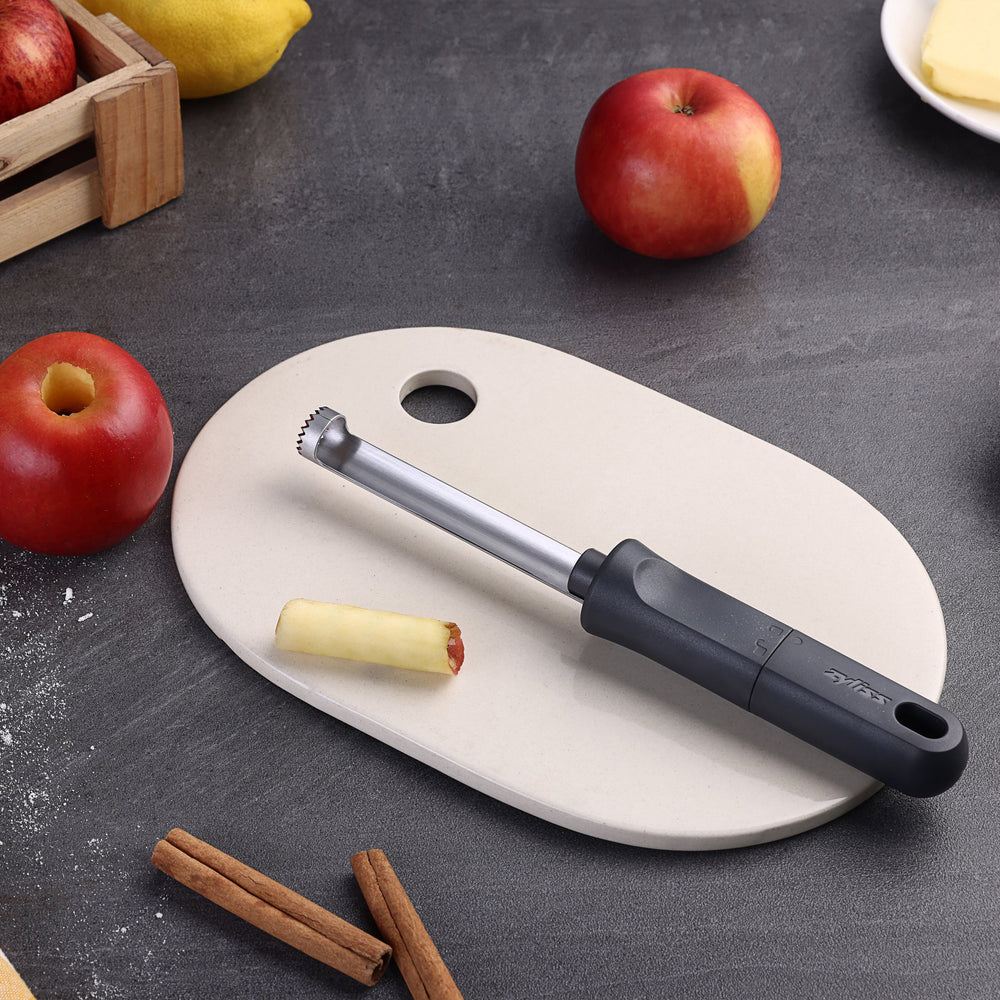 The Zyliss Apple Corer is a sleek stainless steel tool with an eco-friendly handle, a serrated circular blade for easy coring, and a hanging hole for convenient storage.