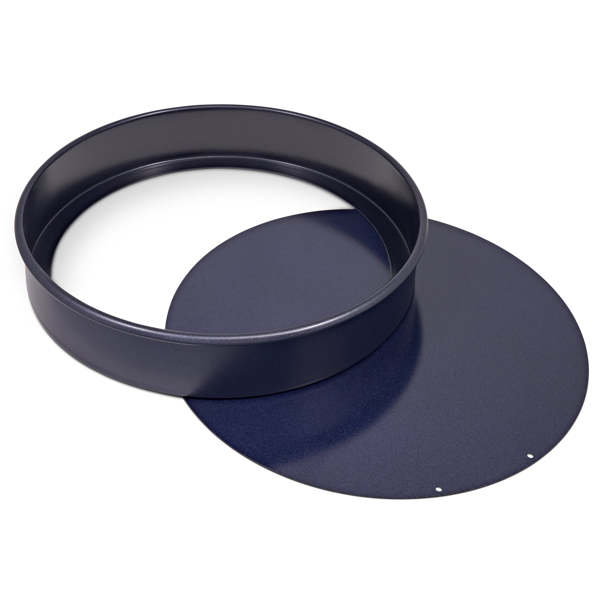 A dark blue, round springform cake pan with its detachable base removed and placed next to the pan on a white background.