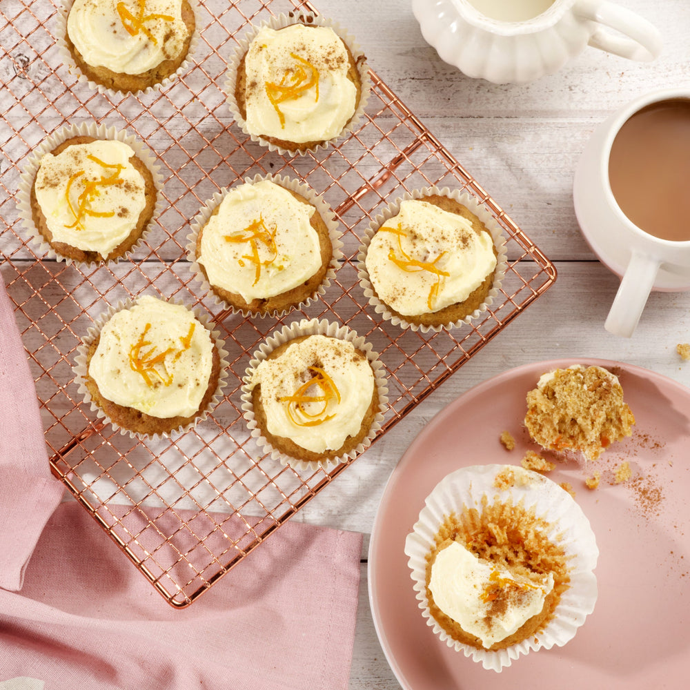 A Zyliss Durable Non-Stick 12 Hole Muffin Pan in black is displayed on a plain light background.