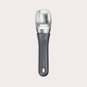 The Zyliss Ice Cream Scoop, featuring a wide deep bowl and eco-friendly handle, is displayed against a plain light background. 
